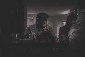 man-smokes-and-plays-chess